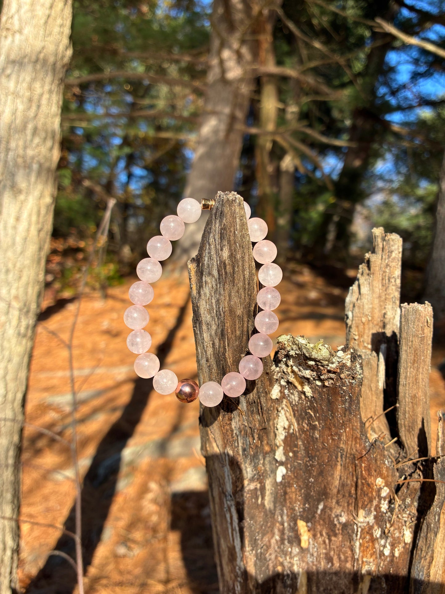 “Handmade rose quartz gemstone bracelet by Mysuvelas, symbolizing love, calm, and clarity, photographed in natural light.”